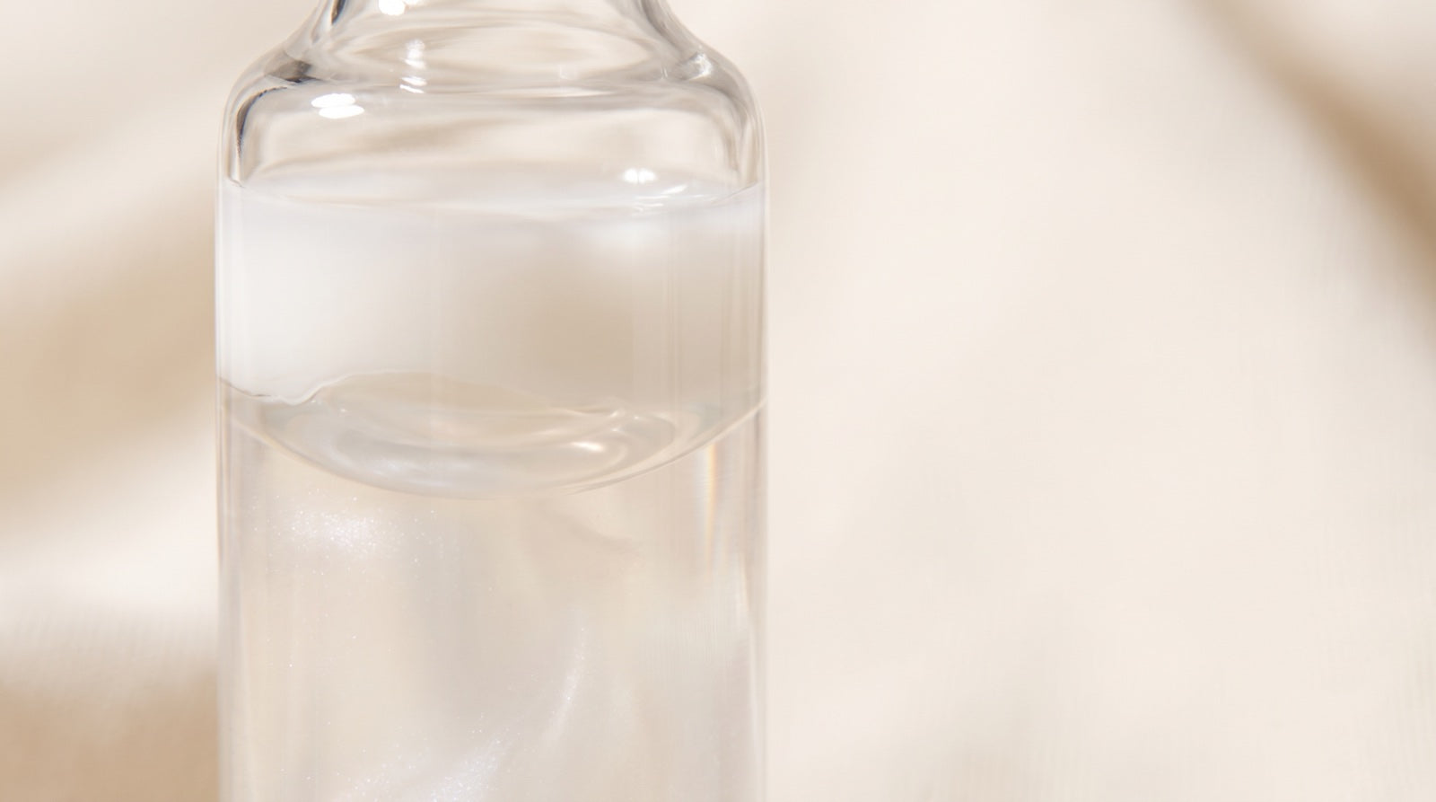 The two-phase formula separating into its oil and water layers