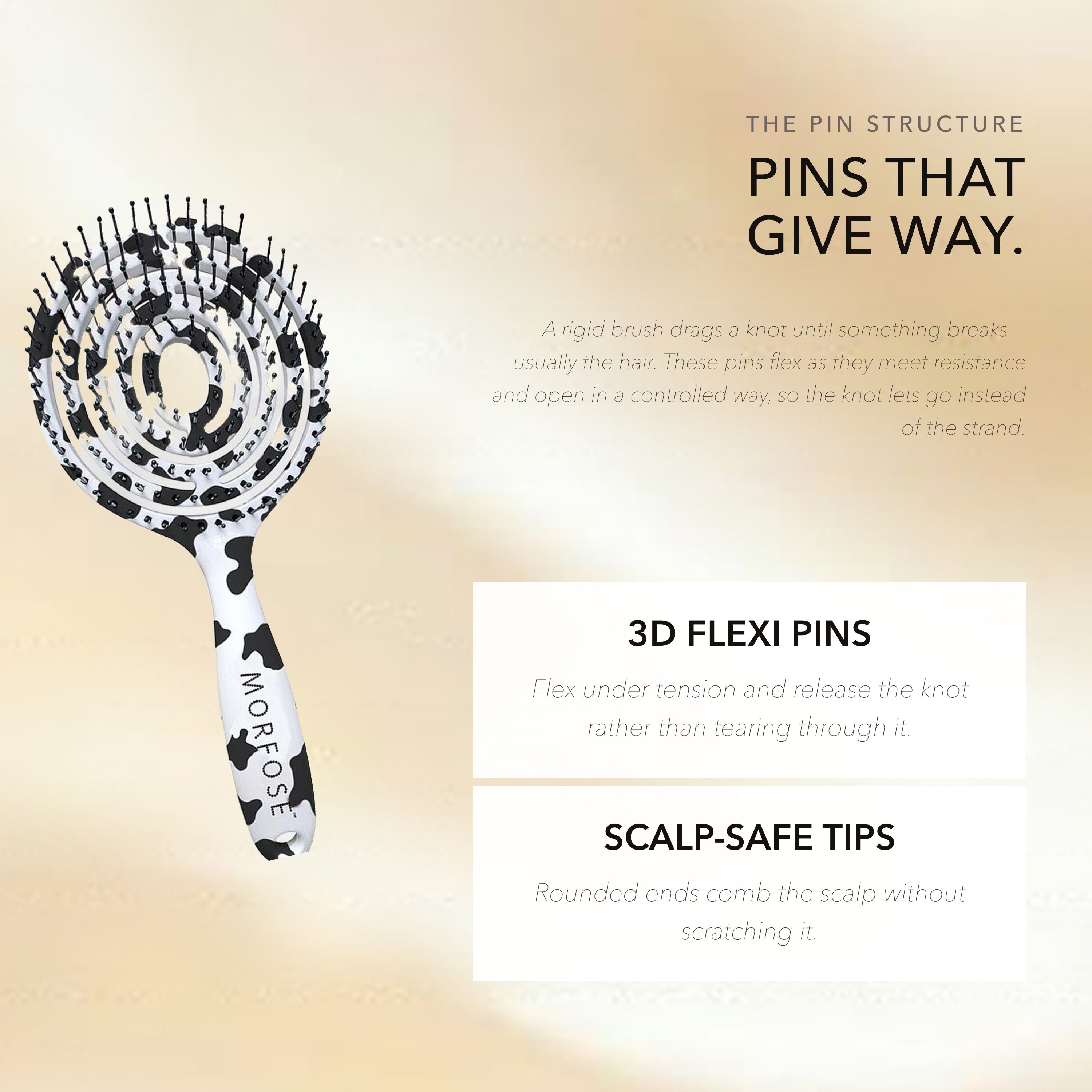 Morfose detangling brush with flexible pins bending under tension against hair