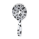 Morfose Milk Therapy detangling hair brush, cow print, product photo on a white background