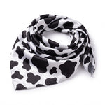Morfose Milk Therapy Bandana — folded cow-print satin bandana
