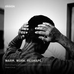 Hands working Ossion Medium Hold Wax through dry hair