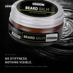 Ossion Beard Balm tin resting on rippling water