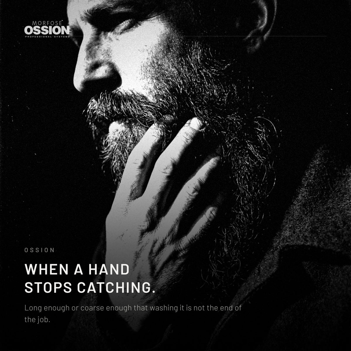 A hand running down through a long soft beard without catching