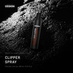 Ossion Clipper Spray can on wet black stone, lit from one side