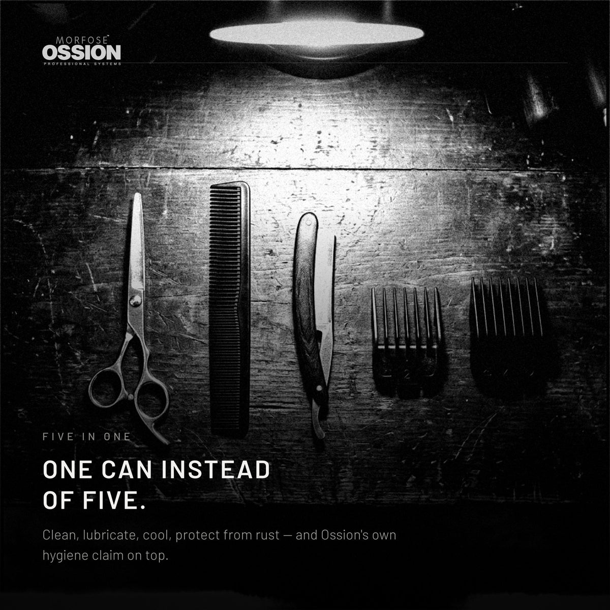 Barber tools laid out on a dark workbench