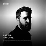 Bearded man with the matte, textured shape Ossion Beard & Hair Cream holds