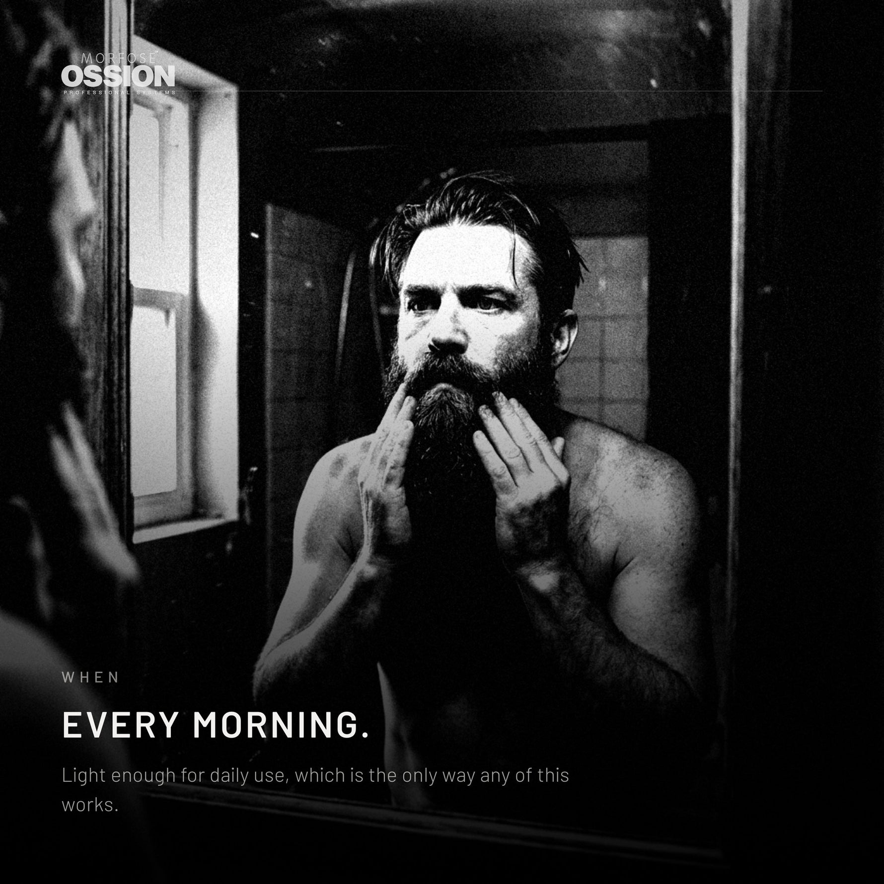 A man working Ossion Beard Serum through his beard in the morning