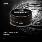Ossion Beard & Hair Cream tin resting on rippling water
