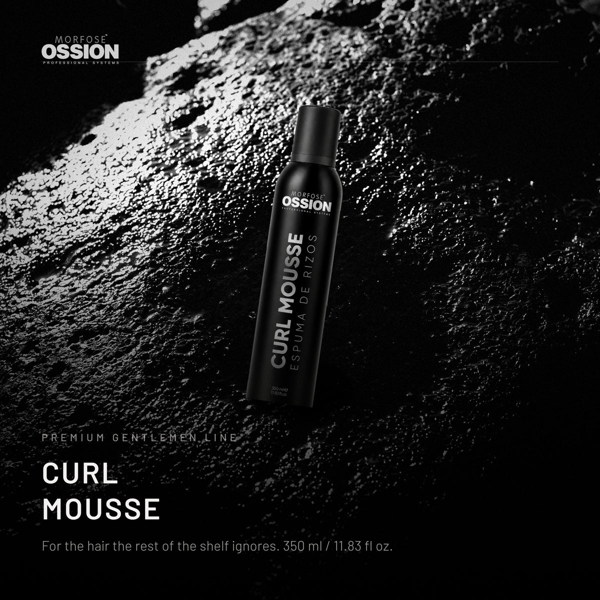 Ossion Curl Mousse can on wet black stone, lit from one side