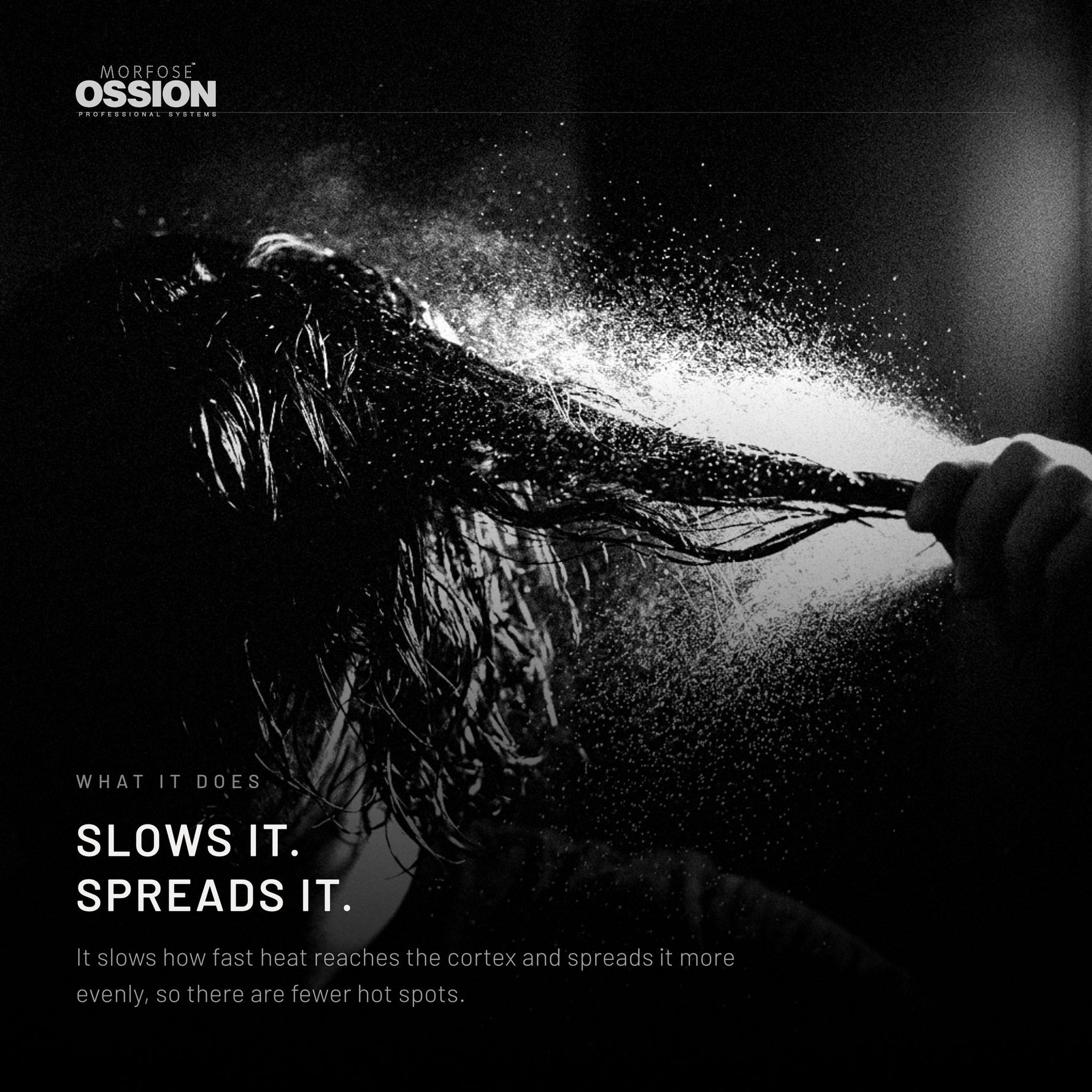 A fine mist of heat protectant settling on a section of hair